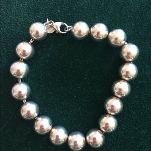 Stealing Silver Bead Tiffany & CO Bracelet.